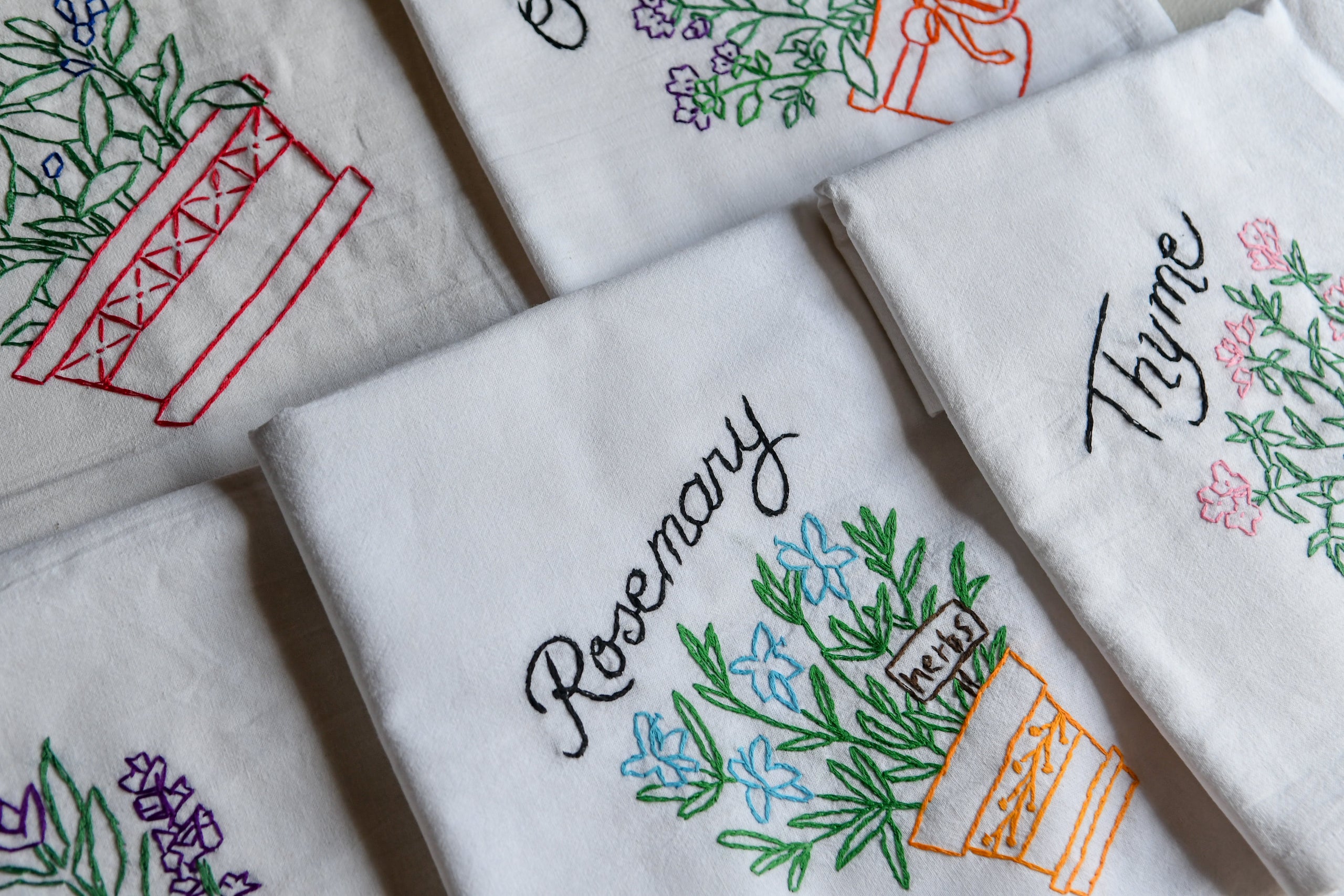 Tea towels hand-embroidered with my mom's favourite herbs - just